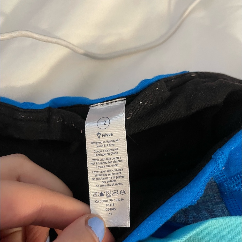 2 pairs of ivivva cropped leggings and 1 pair of ivivva yoga pants
